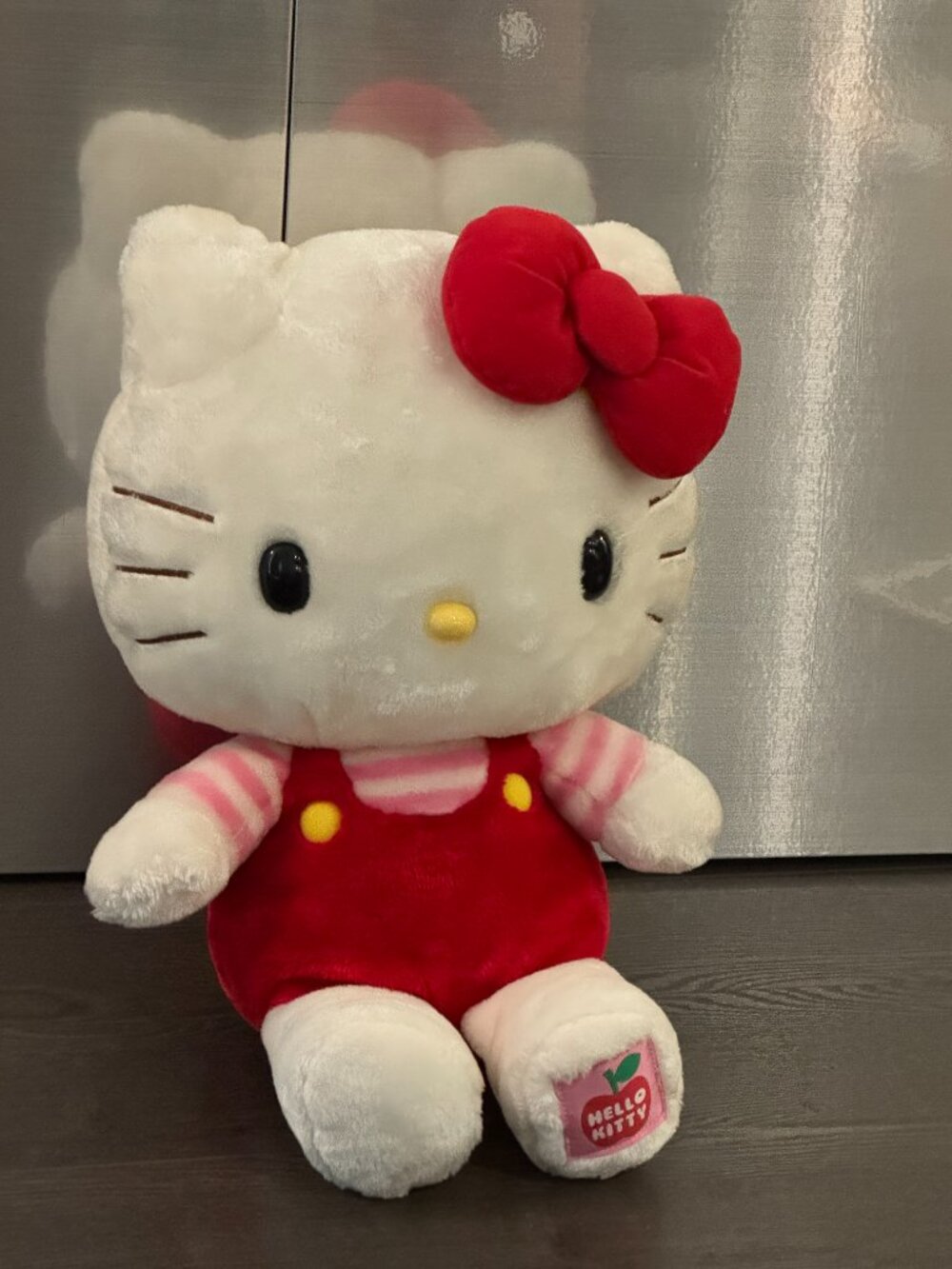 large sanrio hello kitty (from 2012) plush measures 18.5 inches tall preowned